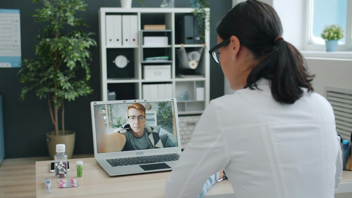 A provider on a video visit with a patient